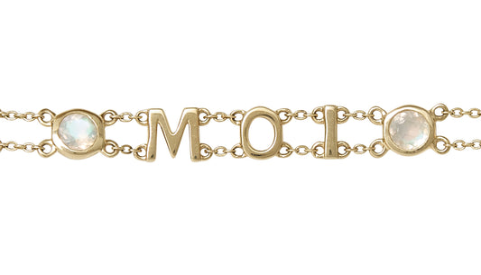 Rainbow Moonstone Rails Bracelet by Unhada. Embrace your inner mystic with the Rainbow Moonstone Rails Bracelet. (Featuring the word "Moi", french for me! It's a unique way to make a statement about yourself.) The custom 14k gold clasp is accented with diamonds and adds an extra touch of sparkle, making this bracelet not only a beautiful accessory, but also a meaningful reflection of your individuality.