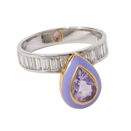 From Unhada's whimsical Tea Party Collection, the Empress Ring exudes royal charm with a modern twist. A cantilevered pear-shaped spinel (1.14 cts) takes center stage, framed by soft lavender enamel and channel-set baguette diamonds (.37 cts). Crafted in 18k white and yellow gold, this one-of-a-kind piece is a statement of refined artistry. Size 6.5.