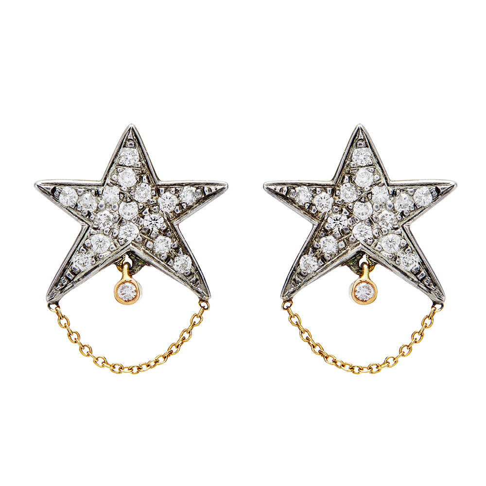 Tiny Dancer Studs Earrings by Unhada - The original version of our bestselling star earrings in oxidized silver. These eye-catching studs feature 0.36 carats of sparkling white diamonds set in a bold, darkened silver star. A classic favorite, these earrings are secured with 18k post backs, adding a celestial sparkle to any outfit.