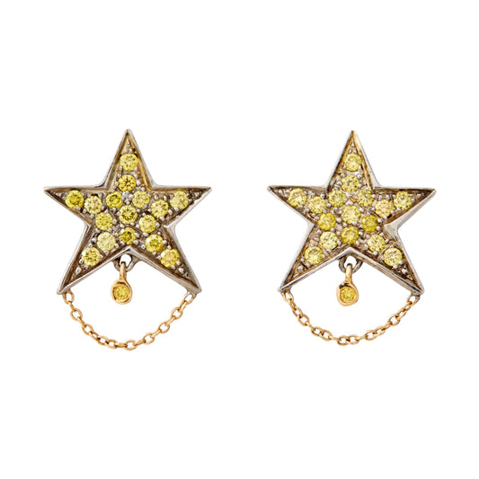 TINY DANCER DIAMOND STUD EARRINGS by Unhada - Add a touch of sparkle to your every day with our Tiny Dancer Diamond Stud Earrings. Crafted in oxidized sterling silver, the stars twinkle with .36 cts of yellow diamonds, and are accented with a delicate 18k yellow gold chain. 18k gold post backs add convenience and security. The perfect addition to any outfit, which is why they are our best selling studs!