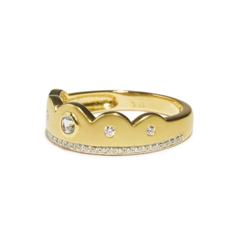 The Chantal Ring by Unhada is a study in simple, feminine beauty. Crafted in 18k gold, its scalloped design is accented with a soft aquamarine (.27 cts) and sparkling diamonds (.12 cts). Perfectly lovely on its own, it also makes an elegant topper for a ring stack. Size 6.5.