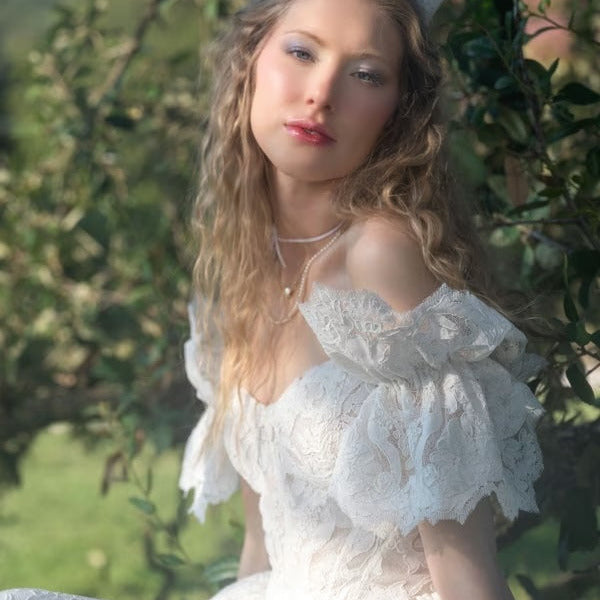 Watters Bridal Dress with pearl necklace